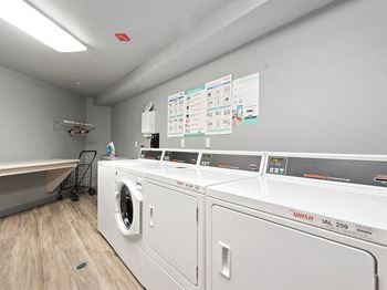 Laundry room at Woodlands at Forbes Lake in Kirkland WA